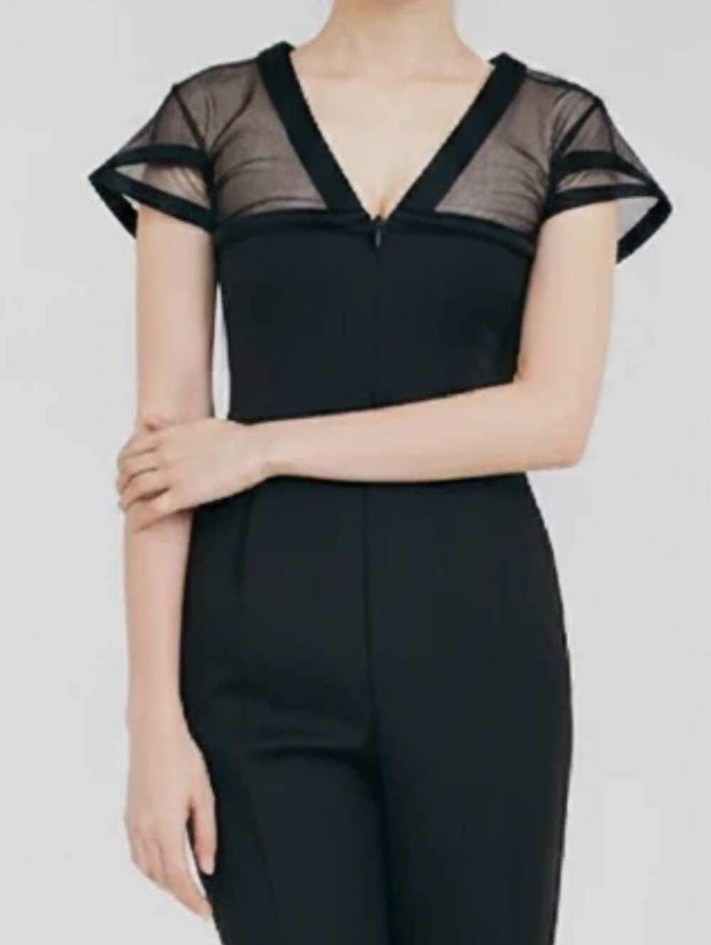 Formal black sheer sparkly top size Al cap sleeves fun design in front …